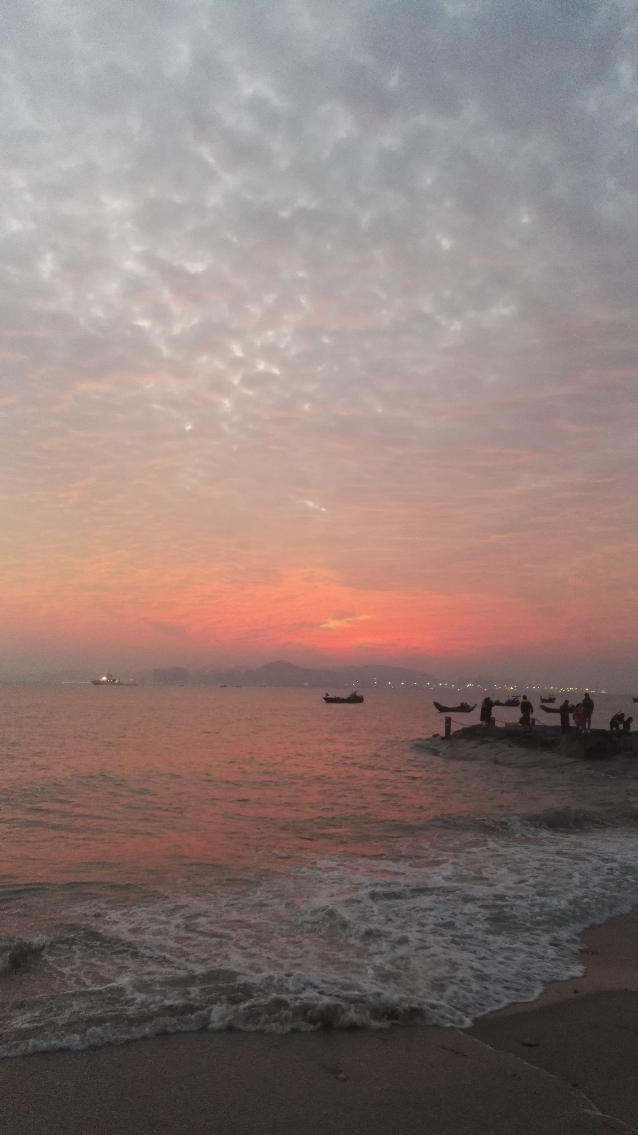 冬日的鷺島海灣夕陽,有著南方女人特有的陰柔之美,不疾不徐,不溫不火