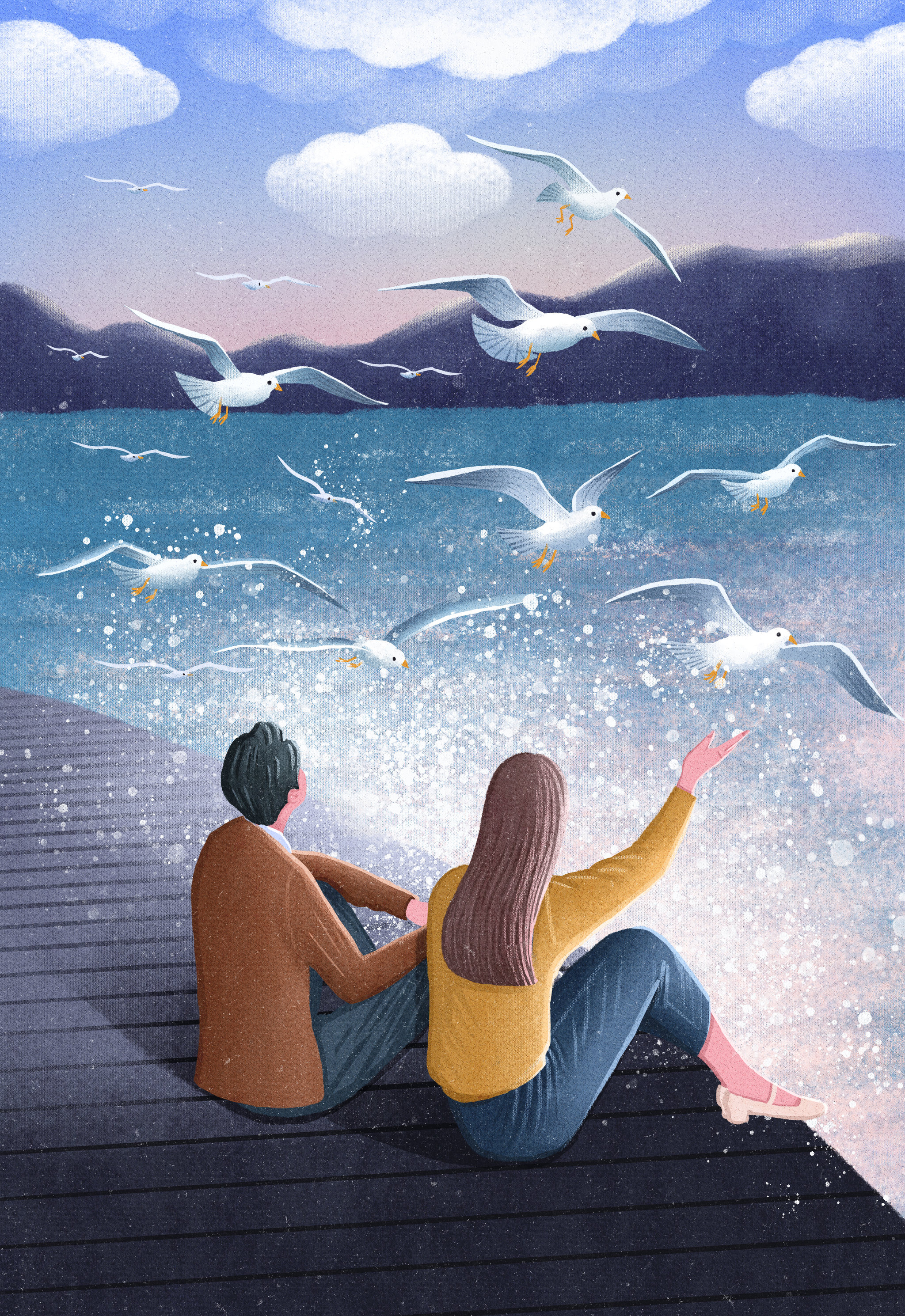 情侣坐在海边看海鸟